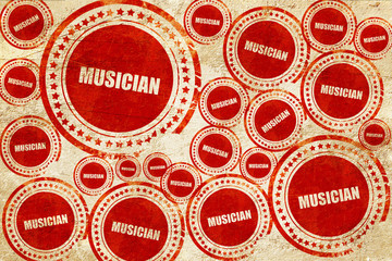 musician, red stamp on a grunge paper texture