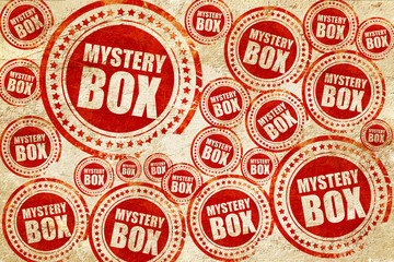 Obraz premium mystery box, red stamp on a grunge paper texture