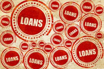 loans, red stamp on a grunge paper texture