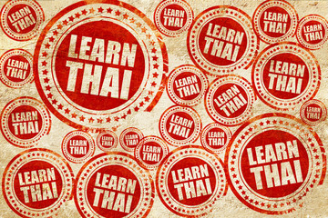 learn thai, red stamp on a grunge paper texture