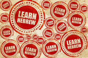 Obraz premium learn hebrew, red stamp on a grunge paper texture