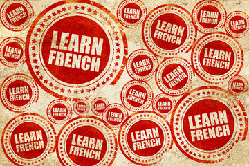 learn french, red stamp on a grunge paper texture
