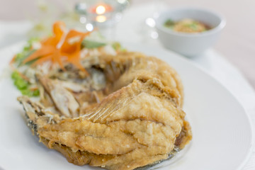 deep snapper fried with fish sauce the delicious favorite menu Thai seafood.