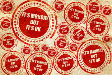 it's monday but it's ok, red stamp on a grunge paper texture