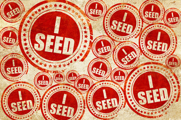 i seed, red stamp on a grunge paper texture