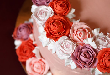 Birthday cake with red roses.