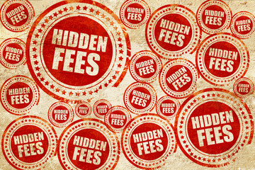 Obraz premium hidden fees, red stamp on a grunge paper texture