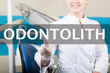 technology, internet and networking in medicine concept - medical doctor presses odontolith button...