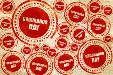 groundhog day, red stamp on a grunge paper texture