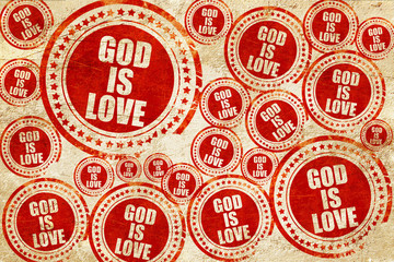 Obraz premium god is love, red stamp on a grunge paper texture