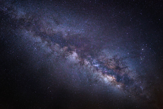 Fototapeta beautiful milkyway on a night sky, Long exposure photograph, wit