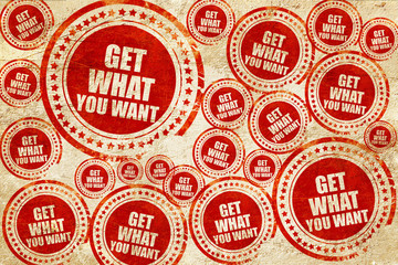 Obraz premium get what you want, red stamp on a grunge paper texture