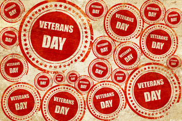 Obraz premium veterans day background, red stamp on a grunge paper texture