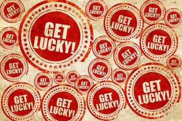 get lucky!, red stamp on a grunge paper texture