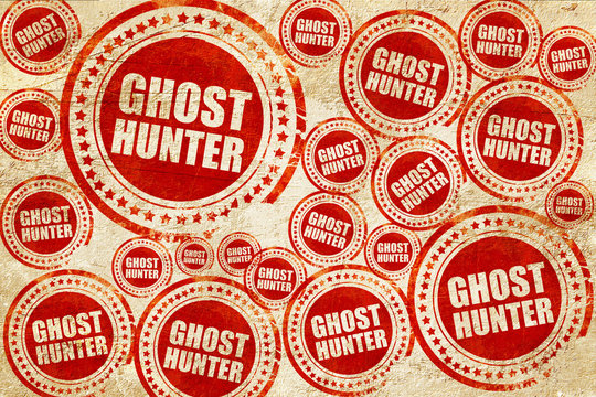 ghost hunter, red stamp on a grunge paper texture