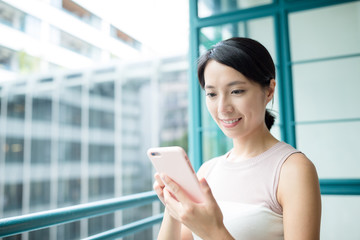 Woman looking at mobile phone