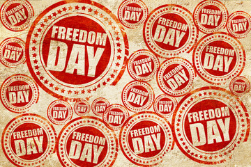 freedom day, red stamp on a grunge paper texture