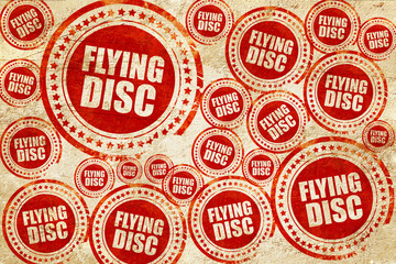 flying disc, red stamp on a grunge paper texture