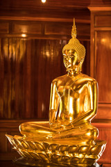 The Most Beautiful Golden Buddha ; Gold face Buddha statue at public worship, Thailand
