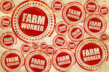 farm worker, red stamp on a grunge paper texture