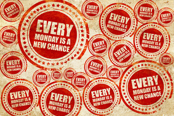 every monday is a new chance, red stamp on a grunge paper textur