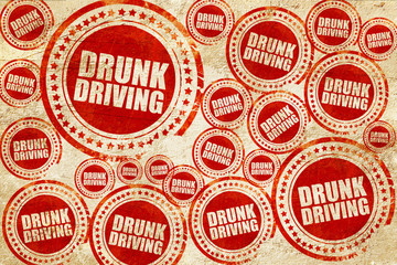drunk driving, red stamp on a grunge paper texture