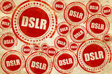 dslr, red stamp on a grunge paper texture