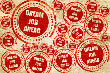 Dream job ahead sign, red stamp on a grunge paper texture