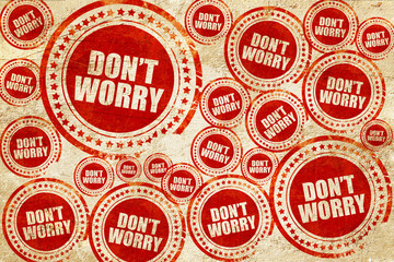 don't worry, red stamp on a grunge paper texture