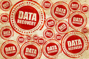 data recovery, red stamp on a grunge paper texture