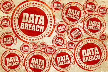 Obraz premium data breach, red stamp on a grunge paper texture