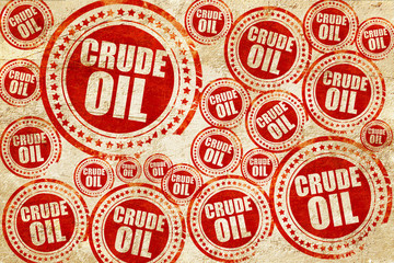 crude oil, red stamp on a grunge paper texture