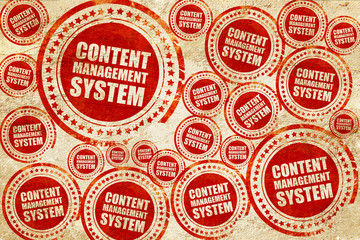 Obraz premium content management system, red stamp on a grunge paper texture