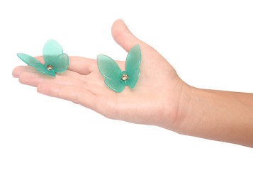 butterfly on woman's hand