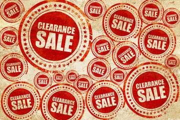 clearance sale, red stamp on a grunge paper texture
