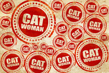 Obraz premium cat woman, red stamp on a grunge paper texture