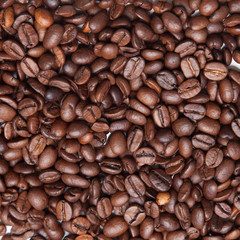 Coffee beans closeup background. top view