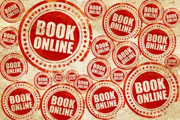 book online, red stamp on a grunge paper texture