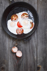 Omelet with tomatoes, parsley.  Rustic breakfast. Selective focu