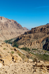 in oman  the old mountain gorge and canyon the deep cloudy  sky
