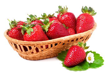 strawberries in a wicker basket isolated on white background