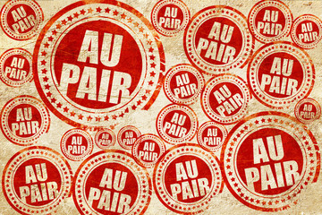 au pair, red stamp on a grunge paper texture