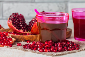 pomegranate juice  and ripe red pomegranate