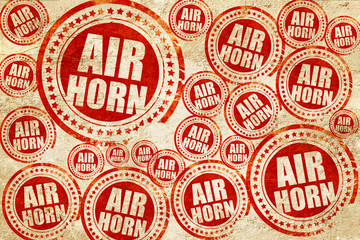 air horn, red stamp on a grunge paper texture