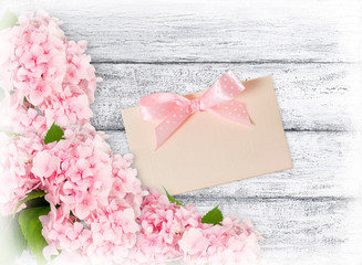 Hydrangeas and greeting card with bow