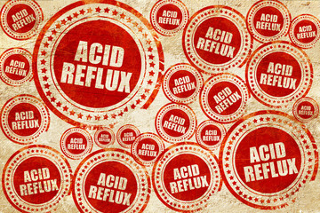 Obraz premium acid reflux, red stamp on a grunge paper texture