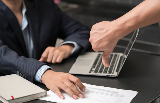 hands with thump down of a businessman