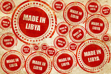 Made in libya, red stamp on a grunge paper texture