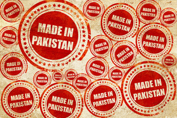 Made in pakistan, red stamp on a grunge paper texture