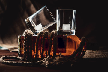 whiskey aged elite alcohol on wooden background